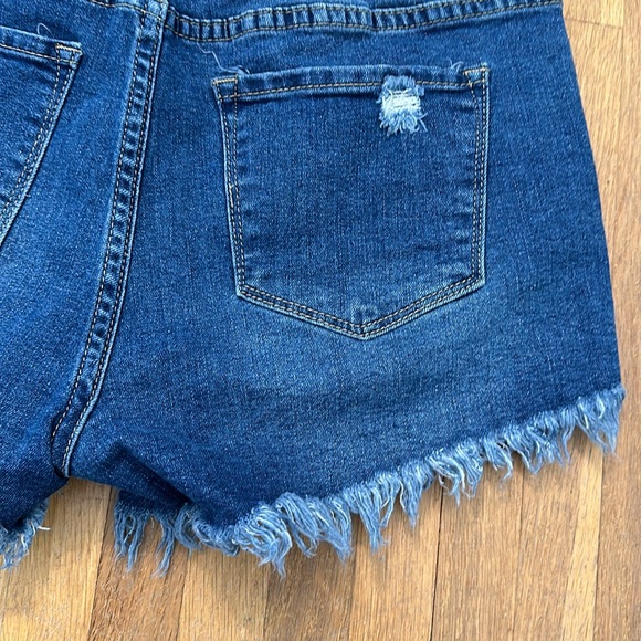 Women’s blue denim distressed jean shorts - Picture 8 of 16